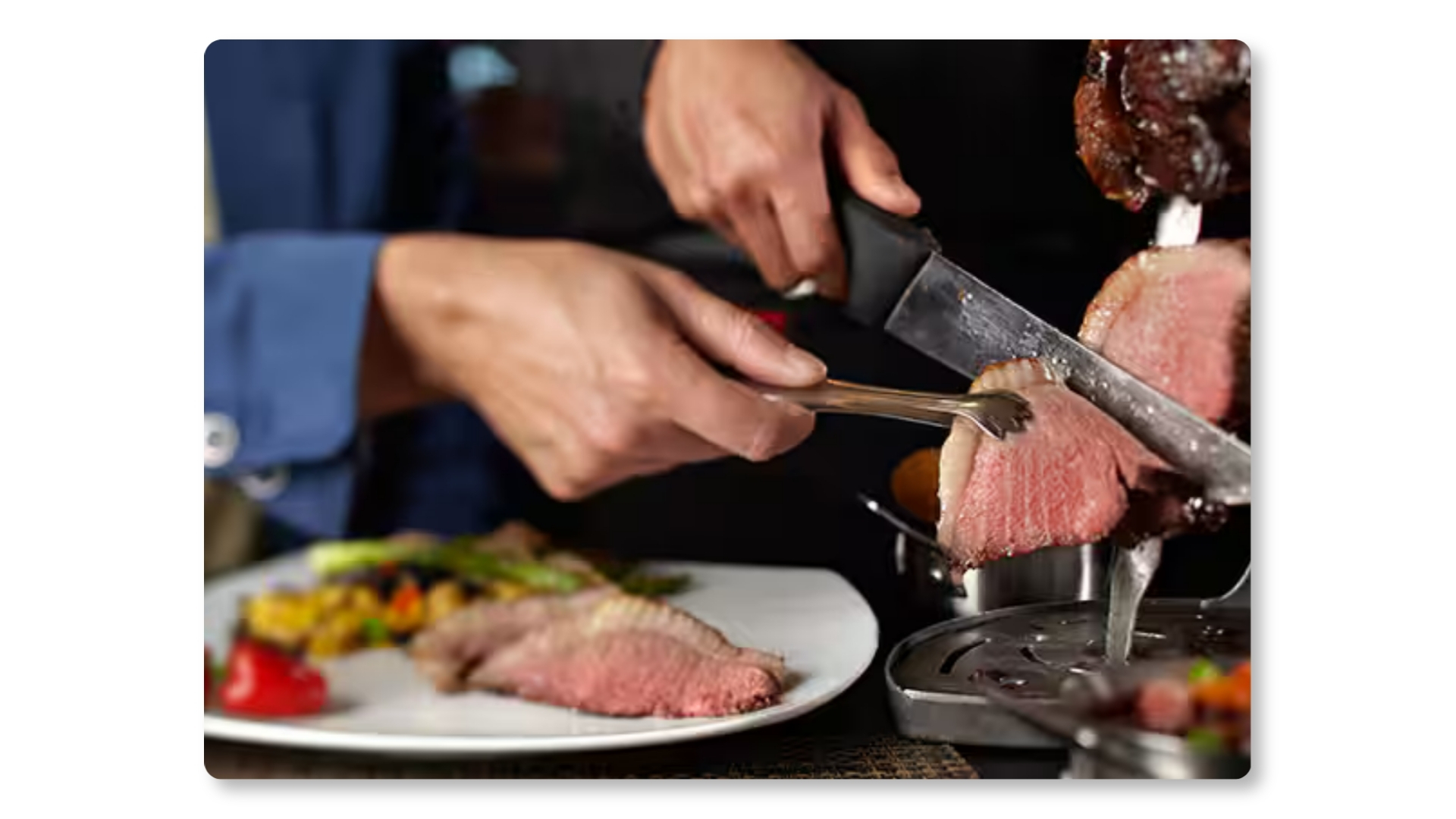 steak being cut on the ncl dawn cruise ship